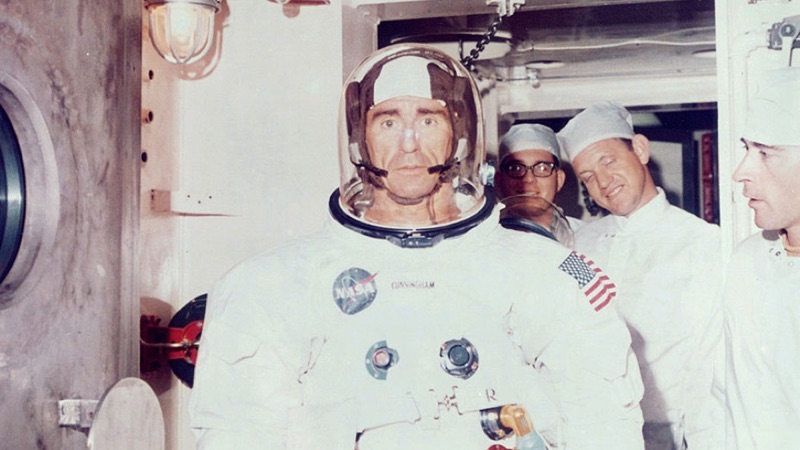 Apollo-era astronaut looking defeated and confused.